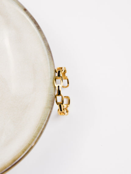 Anel em Aço Dourado Ajustável com Malha Preta