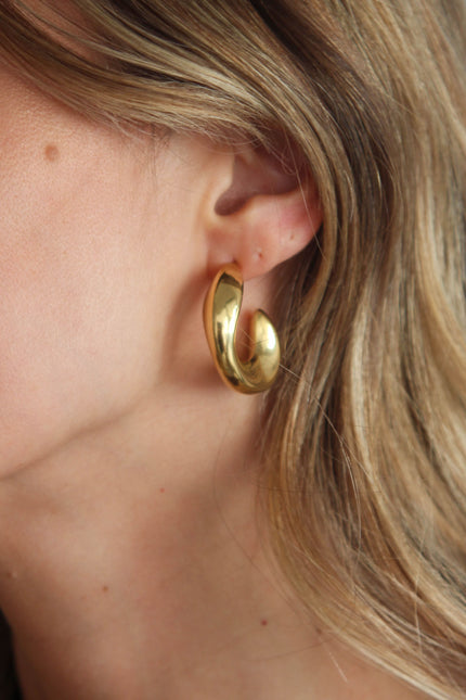 Brincos em Aço Dourados Grandes Ovais