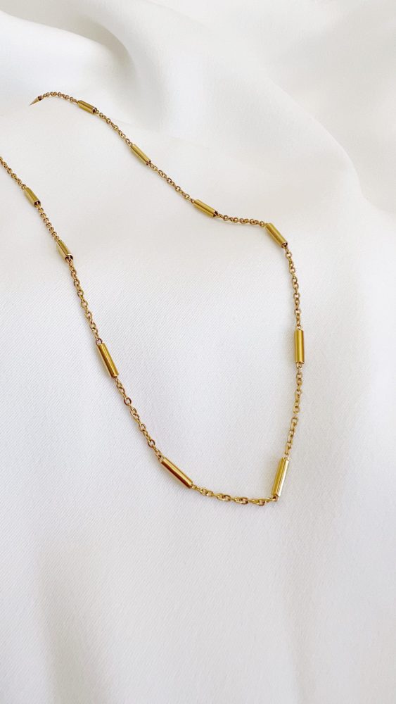 Colar em Aço Dourado com Cilindros