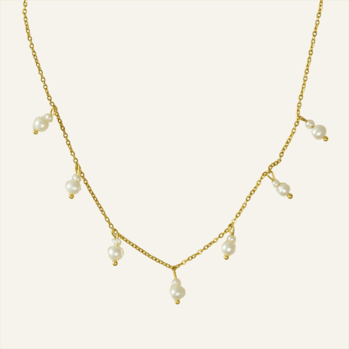 Colar em Aço Dourado com Pérolas Duplas Penduradas