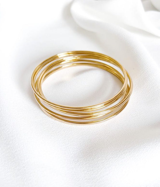 7 Escravas em Aço Douradas