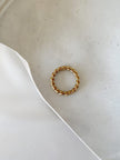 Anel em Aço Dourado Entrelaçado Fininho