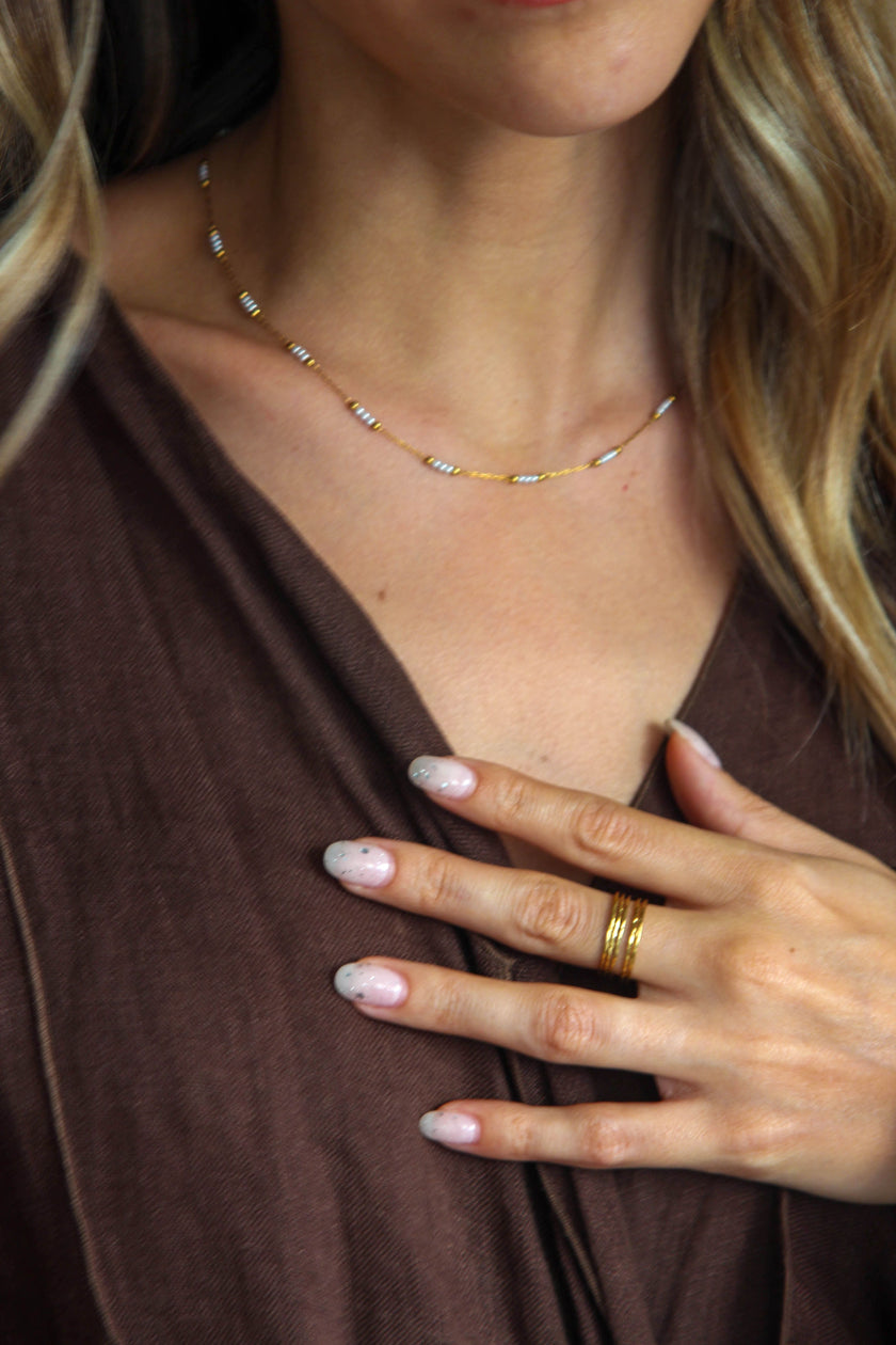 Anel em Aço Dourado Quíntuplo