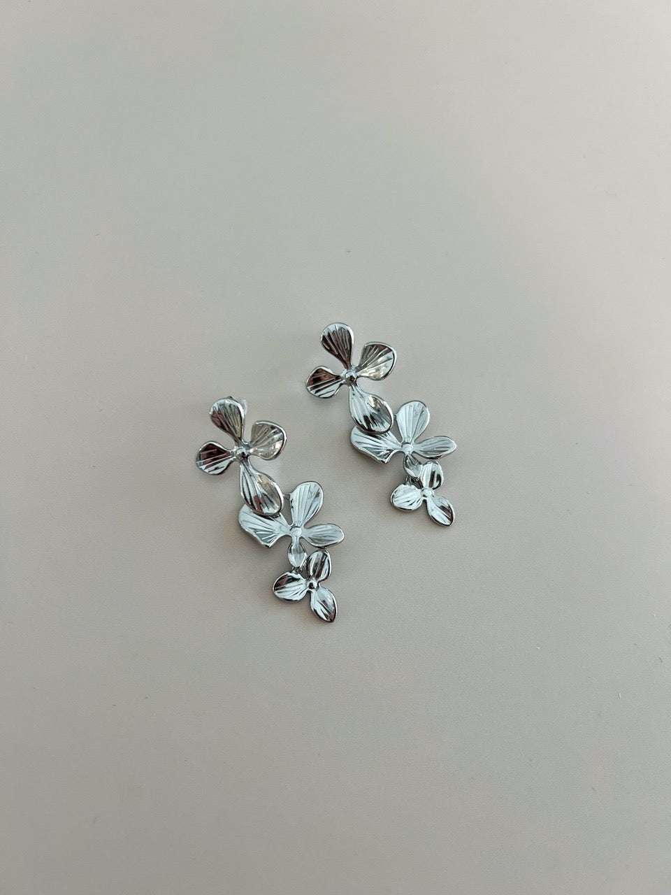 Long Gold Steel Flower Earrings