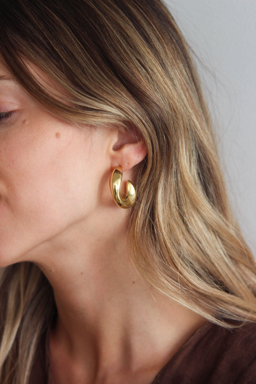 Brincos em Aço Dourados Grandes Ovais