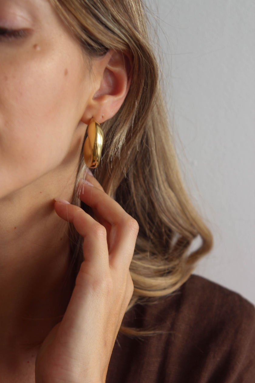 Brincos em Aço Dourados Grandes Ovais