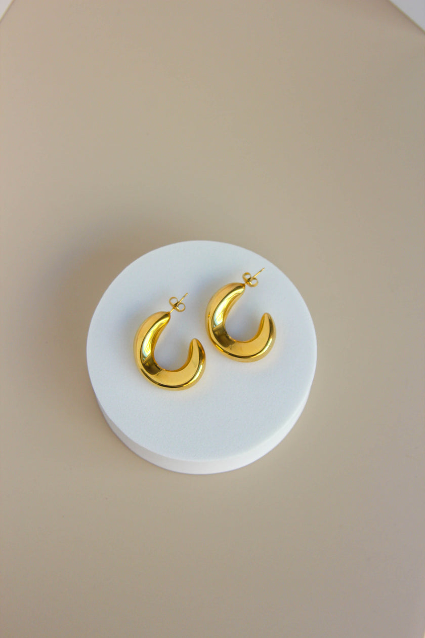 Brincos em Aço Dourados Grandes Ovais