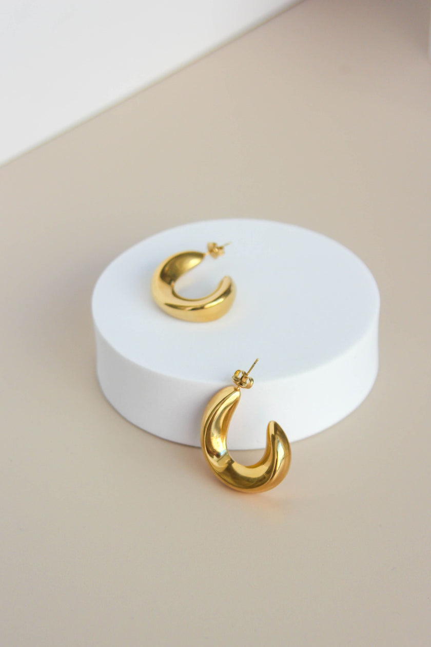 Brincos em Aço Dourados Grandes Ovais