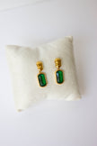 Gold-plated steel earrings with green or clear stone.