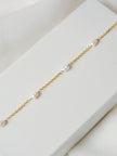 Conjunto em Aço Colar e Pulseira com Pérolas Pequenas Ovais na Malha