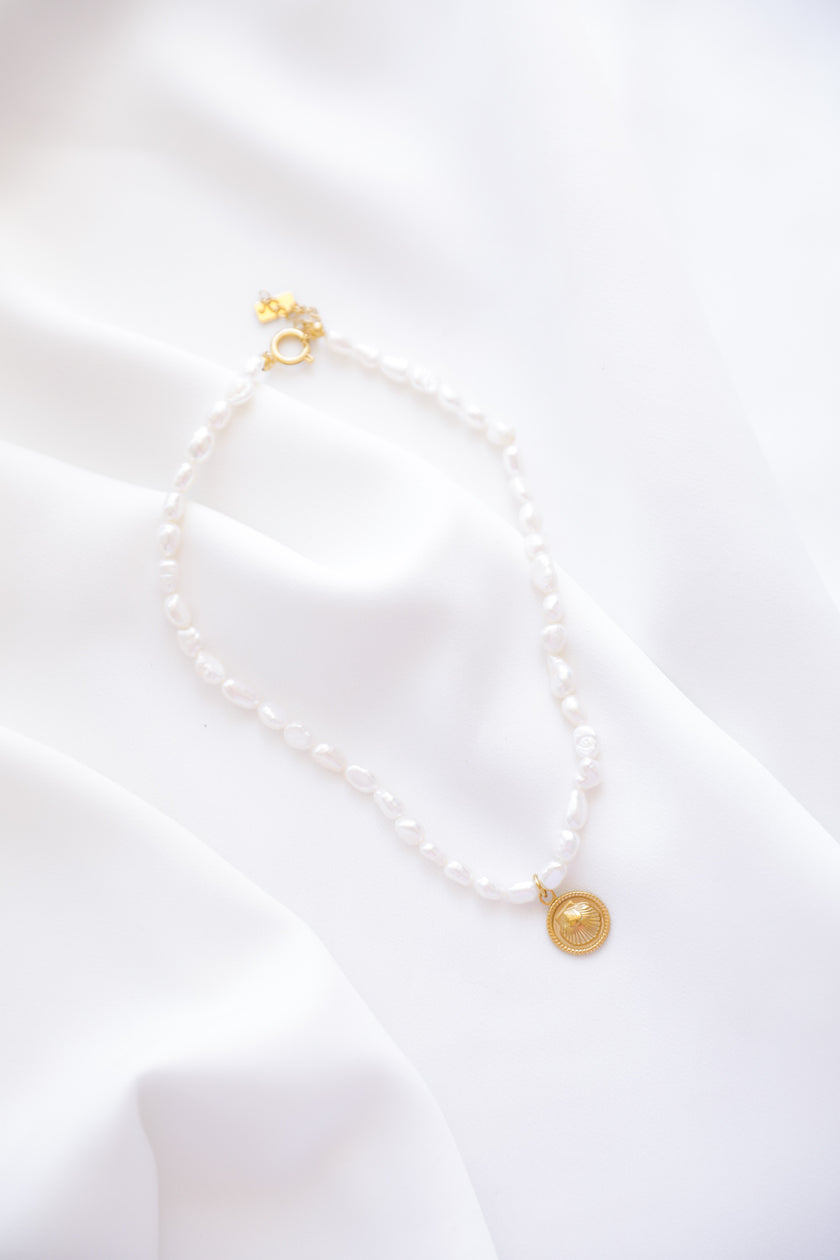 Necklace with Pearls and Round Shell Pendant