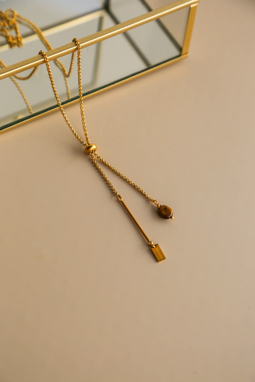 Colar em Aço Comprido Ajustável com Pendente Pedra Olho de Tigre