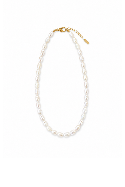 Short gold-tone steel necklace with irregular freshwater pearls.