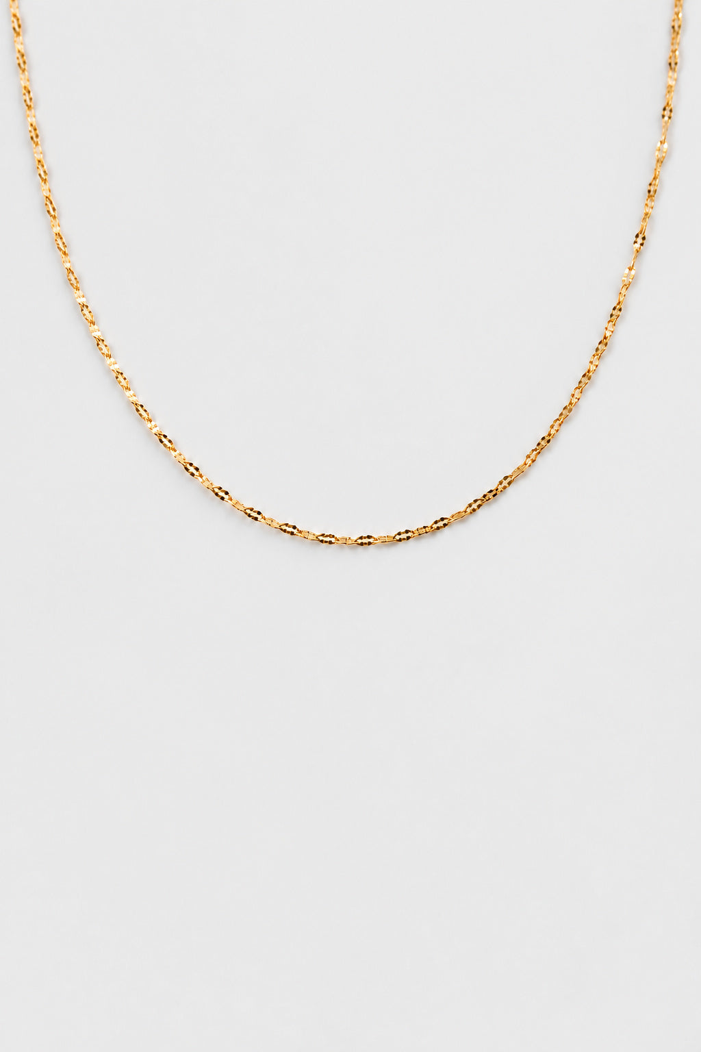 Colar em Aço Dourado Minimalista Torcido