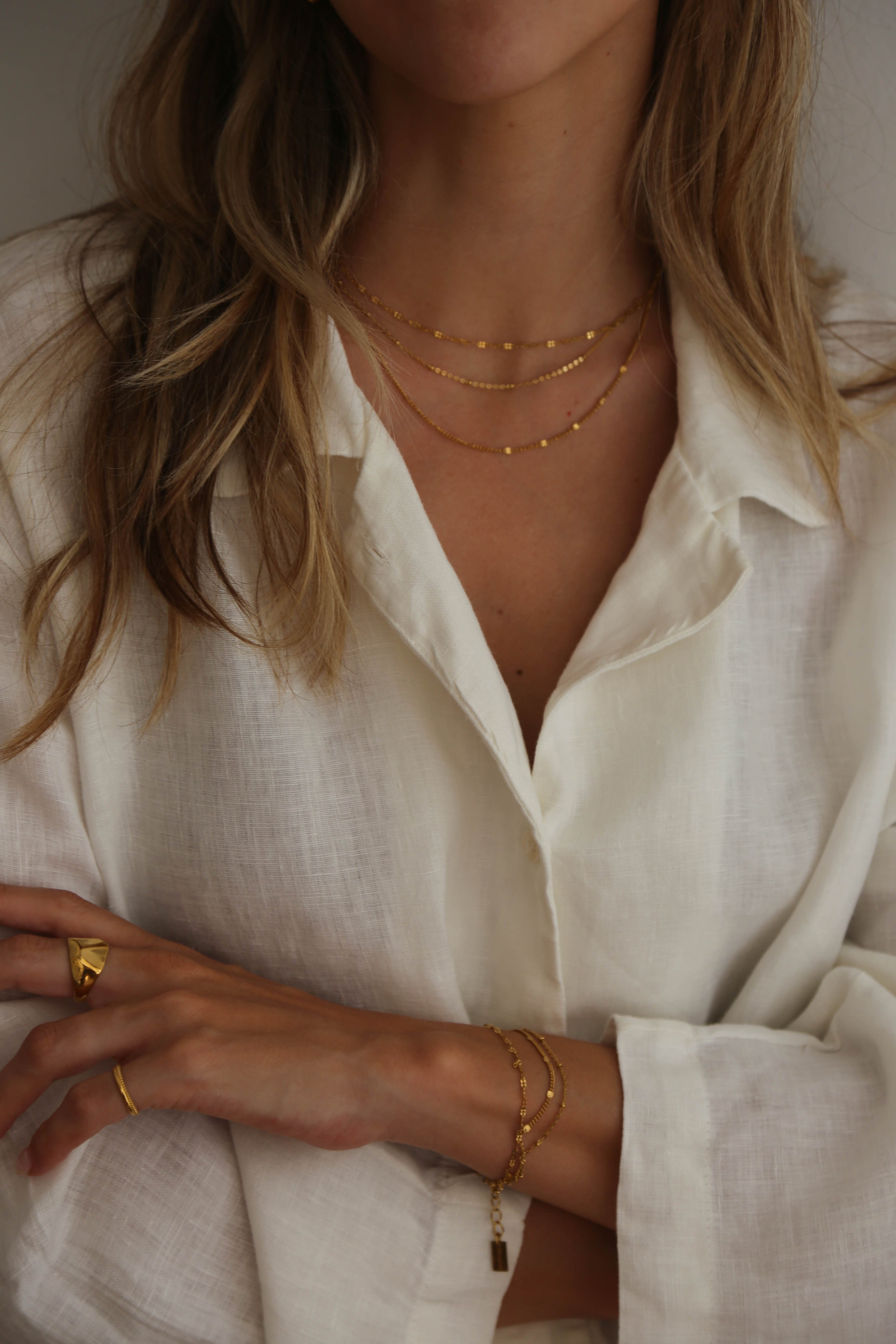 Pulseira em Aço Dourada Minimalista Tripla