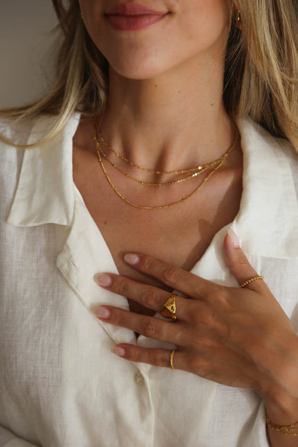 Colar em Aço Dourado Minimalista Triplo
