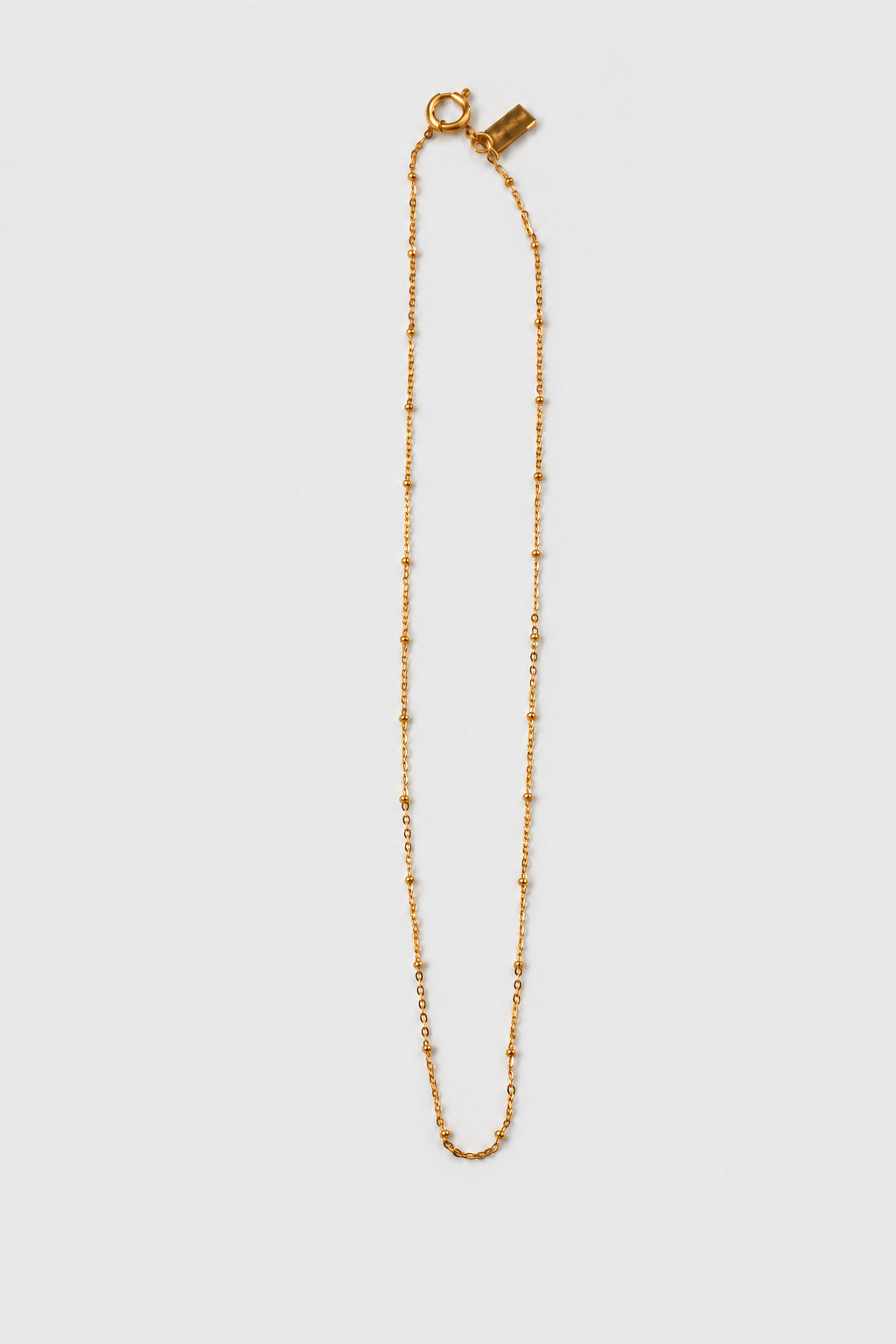 Colar em Aço Dourado Minimalista com Bolinhas