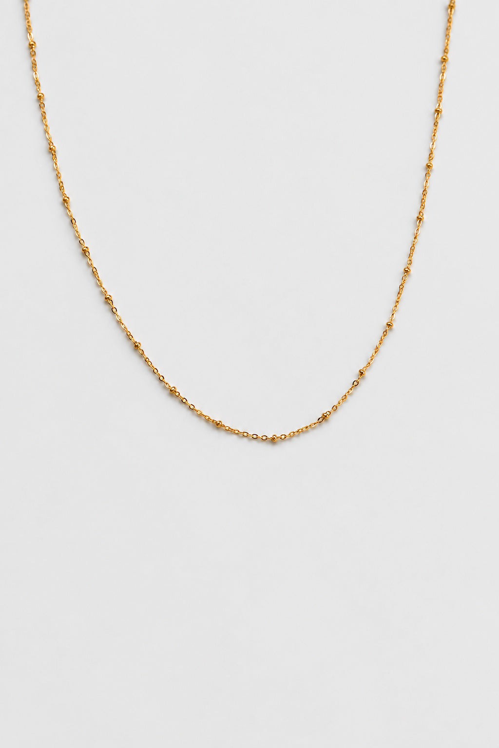 Colar em Aço Dourado Minimalista com Bolinhas