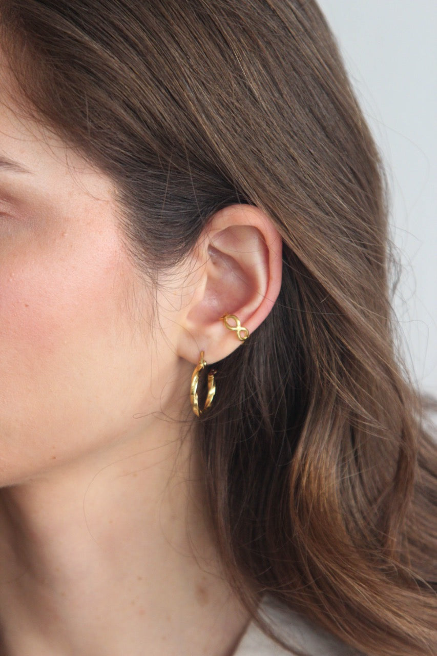 Earcuff em Aço Infinito Dourado ou Prateado