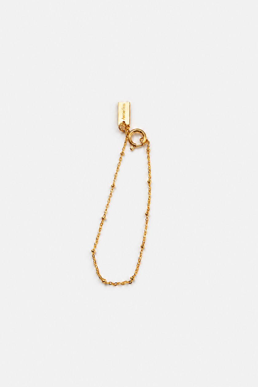 Pulseira em Aço Dourada Minimalista com Bolinhas1