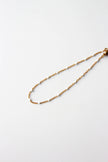 Pulseira de Pé em Aço com Bolinhas Brancas