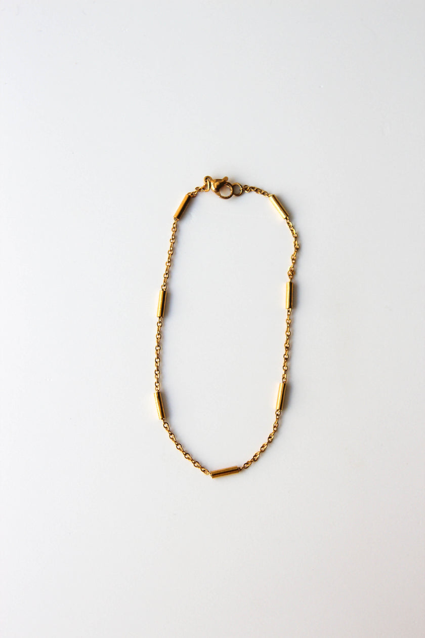 Pulseira de Pé em Aço com Cilindros