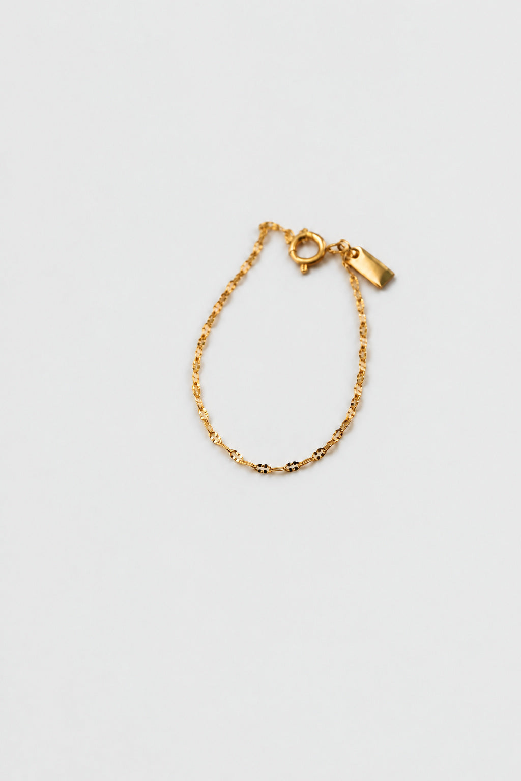 Pulseira em Aço Dourada Minimalista Torcida