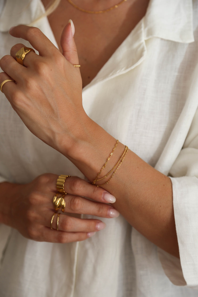Pulseira em Aço Dourada Minimalista Tripla