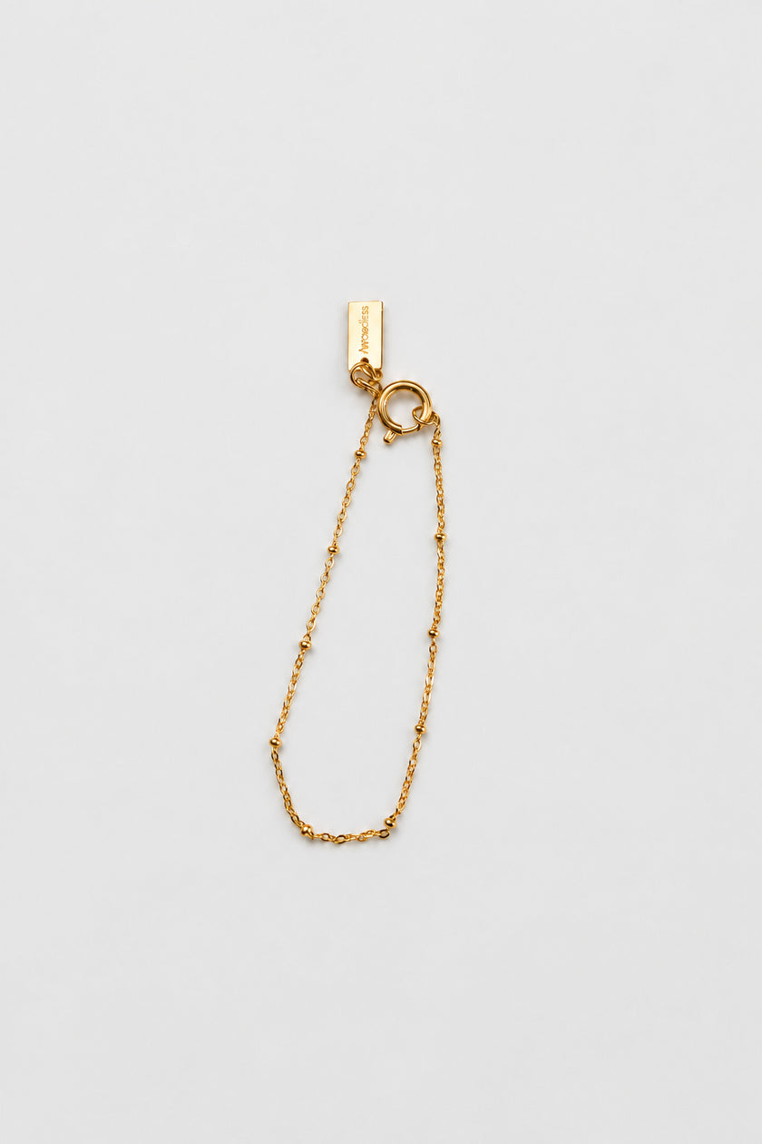 Pulseira em Aço Dourada Minimalista com Bolinhas