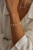 Pulseira em Aço com Pérolas Naturais