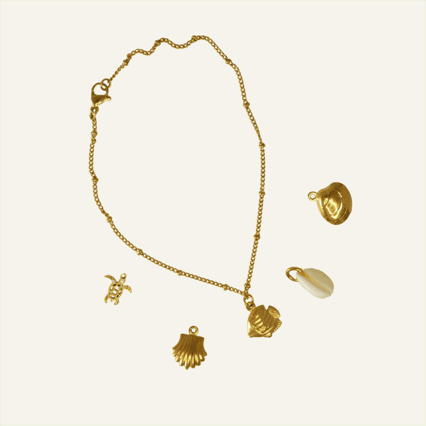 Pulseiras em Aço Douradas com Pendente