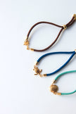 Pulseiras Coloridas com Medalhas